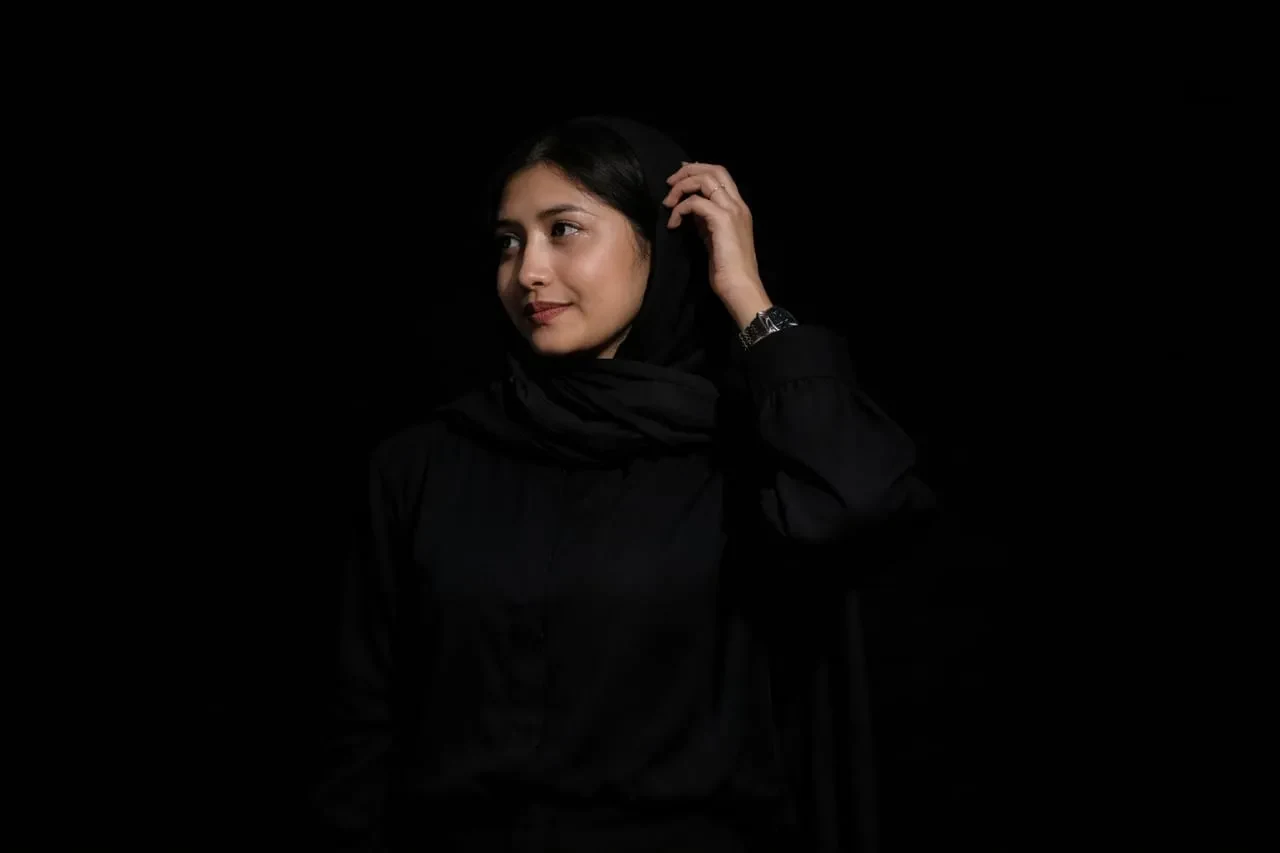 Adhila T